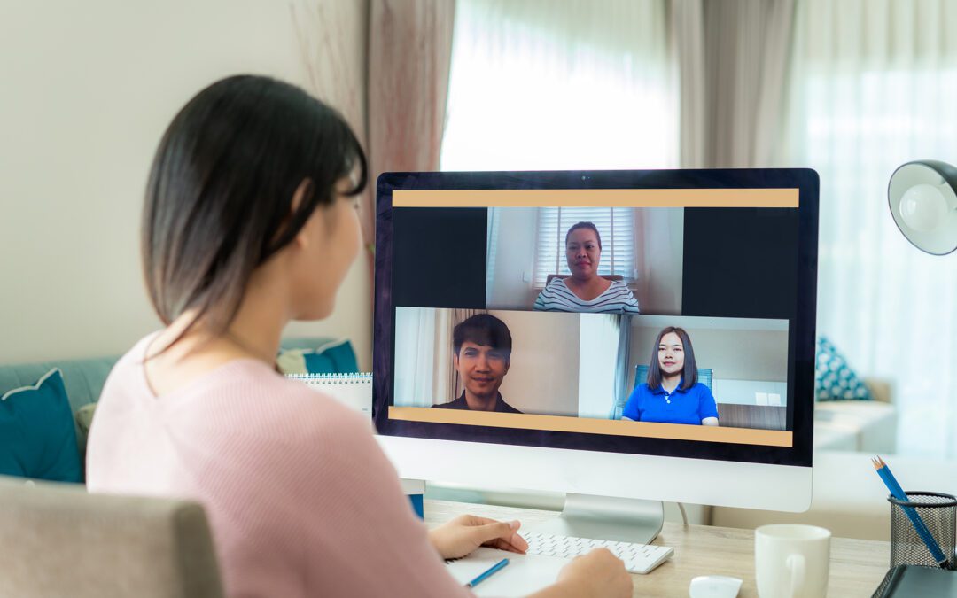 A woman in a Donor Communication meeting